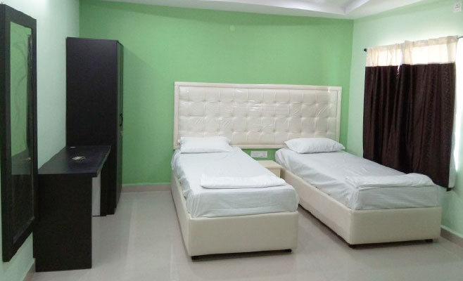 luxurious-suits akshaya gardens double bedroom